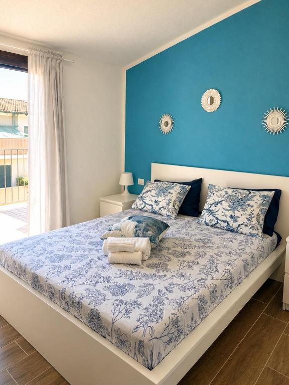 Il letto preparato per l’arrivo, L'Attico Blu a Valledoria