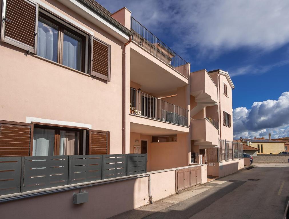 La palazzina, da Via Perugia, L'Attico Blu a Valledoria