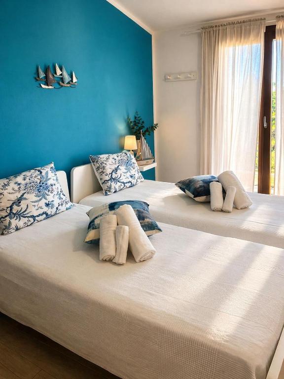 La camera turchese, L'Attico Blu a Valledoria